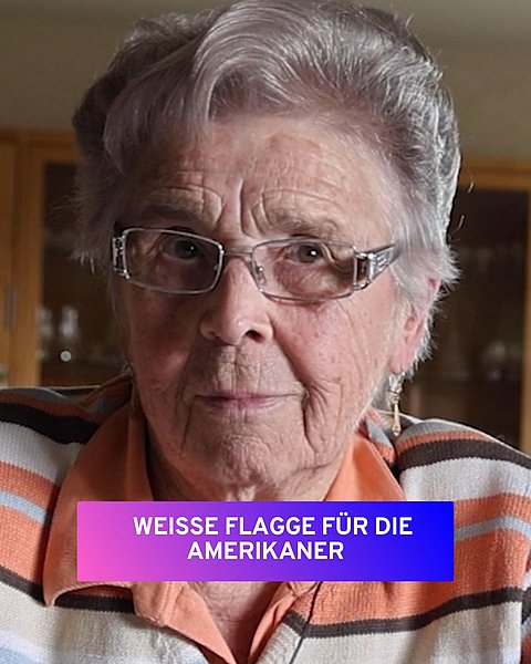 Rosemarie Bärmann blickt in die Kamera, darunter der Text: weiße Flagge für die Amerikaner
