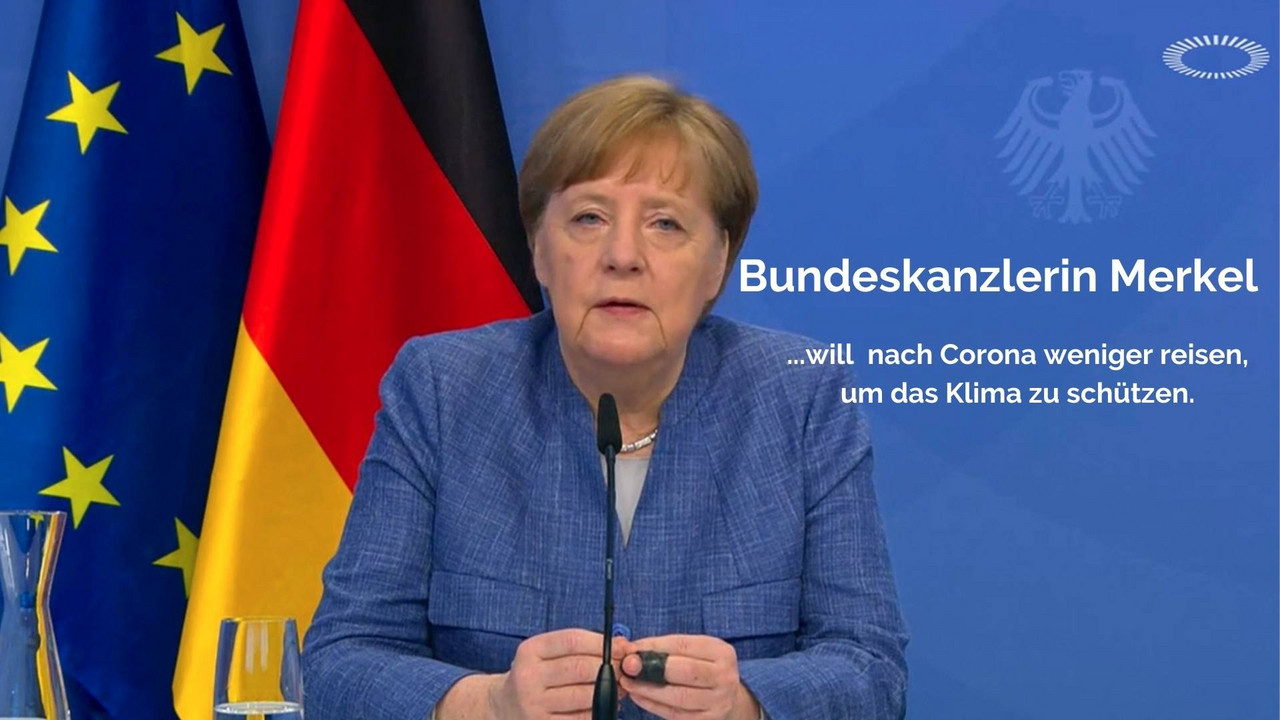 Angela Merkel und die Deuschlandfahne