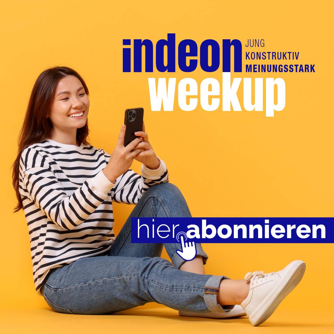 Mensch am Smartphone abonniert den indeon-Newsletter