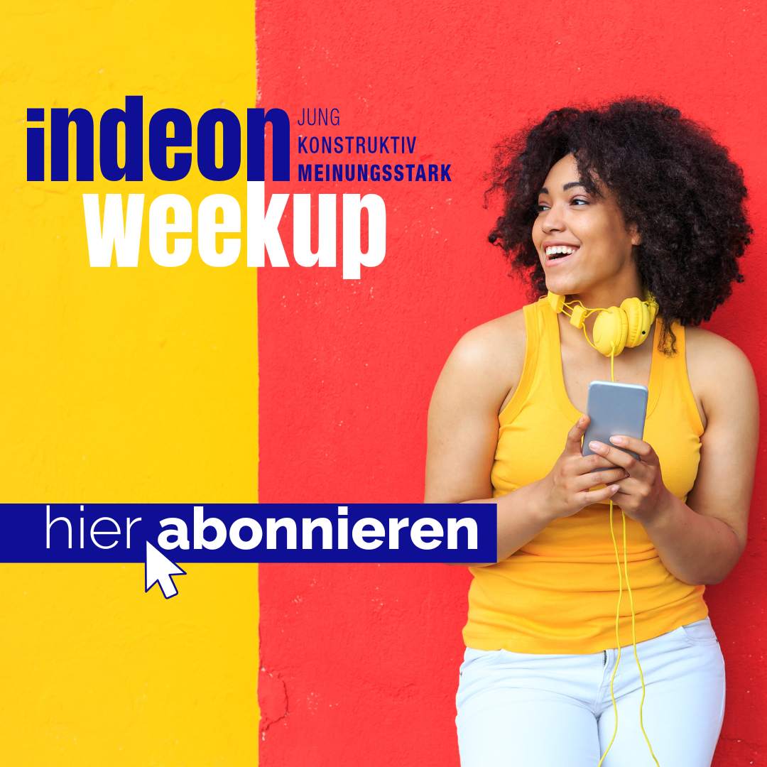 Mensch am Smartphone abonniert den indeon-Newsletter