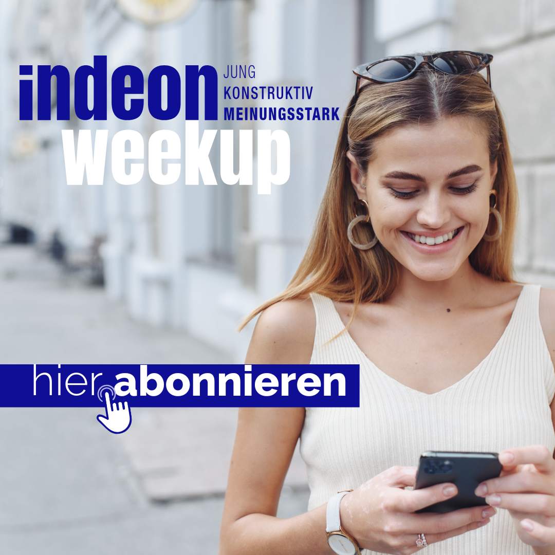 Mensch am Smartphone abonniert den indeon-Newsletter