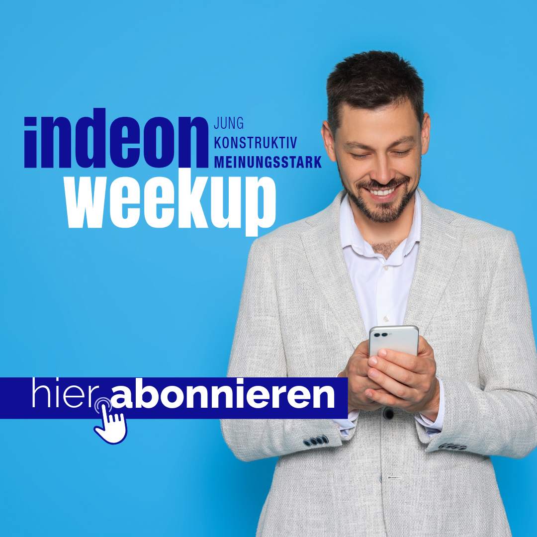Mensch am Smartphone abonniert den indeon-Newsletter